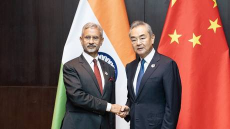 ndia's Foreign Minister Subrahmanyam Jaishankar with China's Foreign Minister Wang Yi  on the sidelines of the 57th Association of Southeast Asian Nations (ASEAN) Foreign Ministers' Meeting in Vientiane on July 25, 2024.