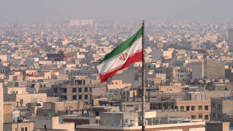 The city of Tehran with the Iranian Flag