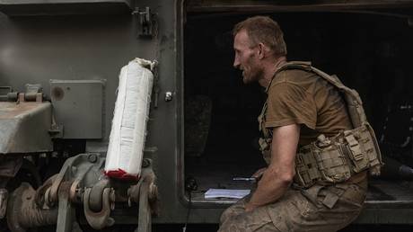 FILE PHOTO: A Ukrainian soldier manning an M109 artillery gun.