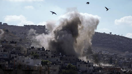 An explosion is seen during an Israeli military operation in the West Bank city of Jenin, Thursday, Sept. 5, 2024.