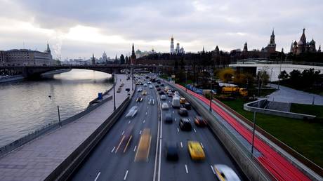 FILE PHOTO: Car traffic on Moskvoretskaya embankment in Moscow.