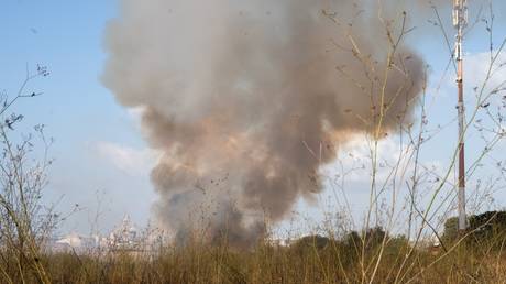 A fire erupts after a ballistic missile fired at Israel from Yemen.