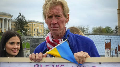 FILE PHOTO: Ryan Routh, the suspect in the second attempted assassination of Donald Trump,  takes part in a rally in Kiev in 2022.