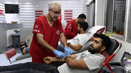 Lebanese people arrive at Red Cross building in Beirut to donate blood following call of Lebanon's Health Ministry as pager explosions left at least 9 people including a child dead and 2800 others injured across Lebanon on September 17, 2024.