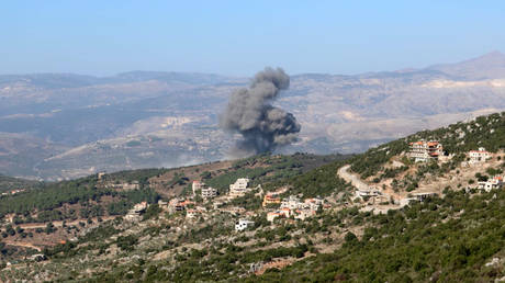 FILE PHOTO: Smoke rises after an Israeli airstrike on a mountainous area in Lebanon