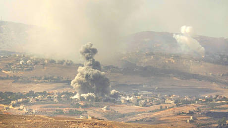 Smoke rises from Israeli airstrikes on villages in the Nabatiyeh district, seen from the southern town of Marjayoun, Lebanon, Monday, Sept. 23, 2024.