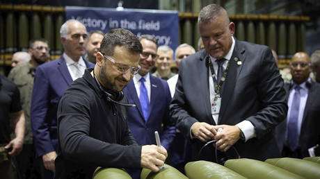 Ukrainian leader Vladimir Zelensky (L) visiting a military munitions factory in Scranton, Pa. on September 22, 2024.