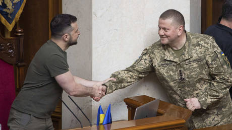 FILE PHOTO: Ukrainian leader Vladimir Zelensky (L) and General Valery Zaluzhny.