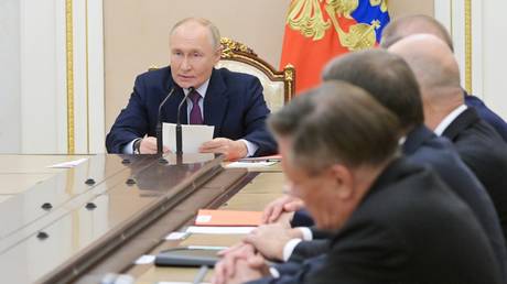 Russian President Vladimir Putin holds a meeting of the Security Council on nuclear deterrence at the Kremlin in Moscow, Russia.