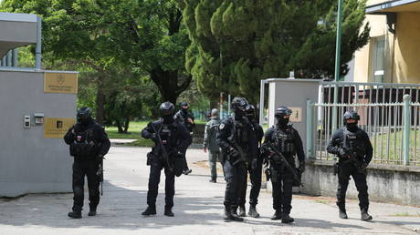 FILE PHOTO: Police patrol outside the Specialised Criminal Court in Pezinok, Slovakia, on May 18, 2024.