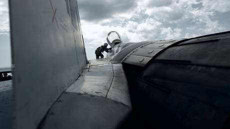 FILE PHOTO: A Ukrainian pilot with a MiG-29 fighter aircraft on August 2, 2023.