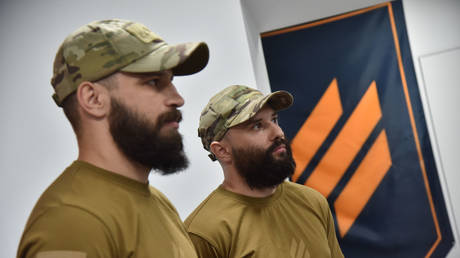 FILE PHOTO. Military officials are seen during the launch of the recruitment center of the Third Separate Assault Brigade in Lviv, Ukraine on July 22, 2023.