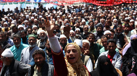 Hundreds of National Conference Political party workers are taking part in a rally after Party Vice President Omar Abdullah filed his nomination for the Baramulla Parliamentary constituency seat at the DC office in Baramulla, Jammu and Kashmir, India, on May 2, 2024.