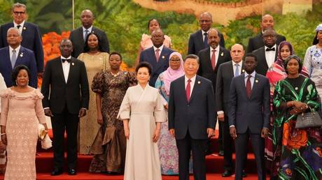 China's President Xi Jinping (c) stands with leaders from African nations ahead of the dinner reception of the 2024 Summit of the Forum on China-Africa Cooperation (FOCAC) at The Great Hall of People on September 4, 2024 in Beijing, China.