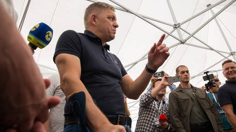 FILE PHOTO: Slovakia’s Prime Minister Robert Fico talking with journalists.