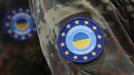 FILE PHOTO: German soldiers wear the patch of the European Union Military Assistance Mission Ukraine (EUMAM UA).