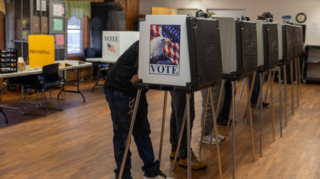 Voters cast their ballots at an early voting location in North Carolina on October 25, 2024.