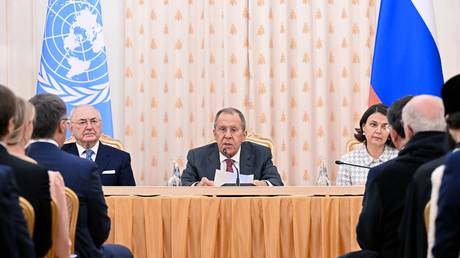 Russian Foreign Minister Sergey Lavrov and Deputy Chairman of the Russian Commission for UNESCO Alexander Dzasokhov, left, December 22, 2023.