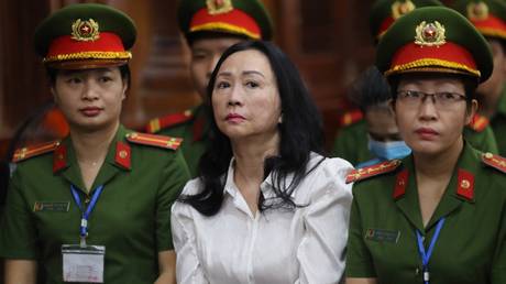 Truong My Lan (C) looks on as she is sentenced to death at a court in Ho Chi Minh city, Vietnam, April 11, 2024