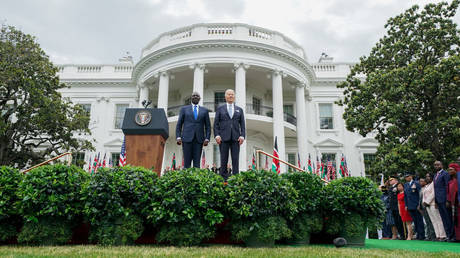 FILE PHOTO.  US President Joe Biden stands with Kenyan President William Ruto during an arrival ceremony on the South Lawn of the White House on May 23, 2024 in Washington, DC.