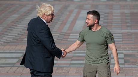 FILE PHOTO: Boris Johnson and Vladimir Zelensky.