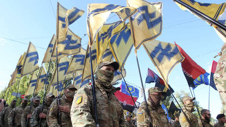 FILE PHOTO. Ukrainian far-right activists holding flags attend the march commemorating the 78th anniversary of the founding of the Ukrainian Insurgent Army.