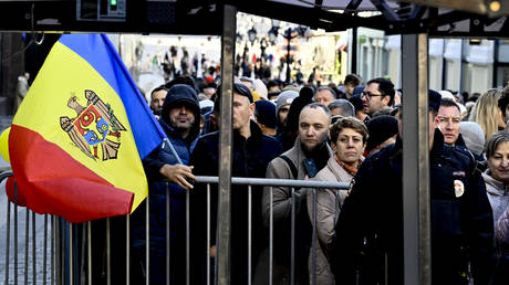 Moldovan citizens wait in line to vote at a polling station in Moscow, Russia during the 2024 Moldovan election, October 20, 2024.