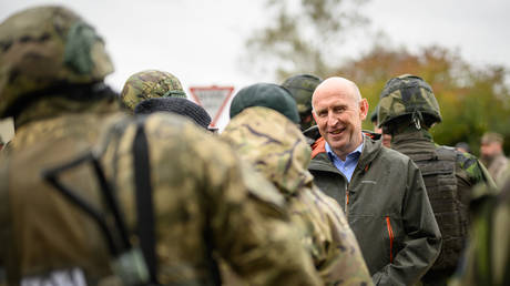 UK Defence Secretary John Healey speaks with Ukrainian soldiers and staff at the Stanford Training Area near Thetford, England.