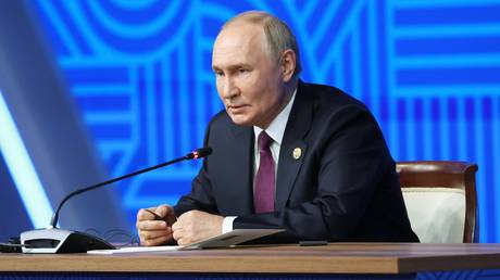 Russian President Vladimir Putin speaks during a press conference on the sidelines of the 16th BRICS Summit in Kazan, Republic of Tatarstan, Russia.