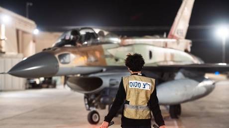 A fighter jet is prepared for takeoff ahead of Israel's attack on Iran at an air base in Israel, October 26, 2024