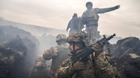 FILE PHOTO: Ukrainian soldiers participate in a training drill at an undisclosed location.