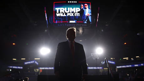 FILE PHOTO: Republican presidential nominee, former President Donald Trump takes the stage during a campaign rally at Lee’s Family Forum on October 31, 2024 in Henderson, Nevada.