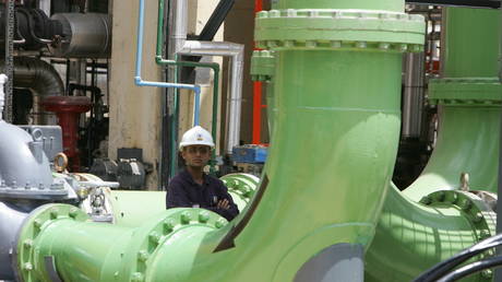 A worker at BPCL Mumbai oil refinery in India.