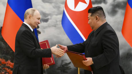 Russian President Vladimir Putin, left, and North Korea's leader Kim Jong Un.