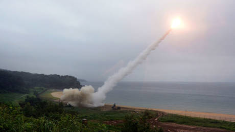 FILE PHOTO: An ATACMS firing a missile into the East Sea/Sea of Japan during a joint training exercise between the US and South Korea