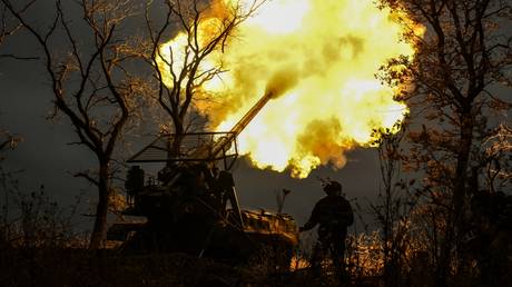 FILE PHOTO: Russian troops fire a 2S7 Malka self-propelled howitzer at Ukrainian positions.