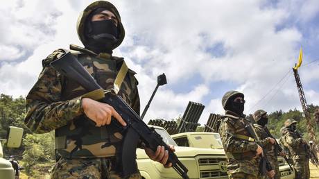 FILE PHOTO. Lebanese Hezbollah fighters in Aaramta, Lebanon.