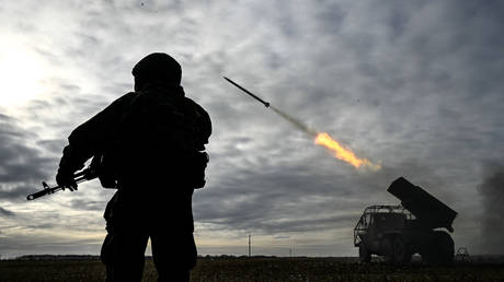 FILE PHOTO: Russian servicemen of the 44th army corps of the Sever (North) Group of Forces fire a BM-21 Grad multiple rocket launcher amid Russia's military operation in Ukraine.