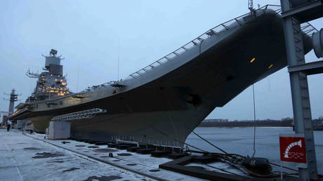 In this handout photograph received from the Defence Ministry on November 16, 2013 aircraft carrier INS Vikramaditya, which was commissioned into the Indian Navy on November 16, 2013, is pictured at the Sevmash Shipyard in Severodvinsk.