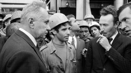 FILE PHOTO. Algerian President Houari Boumediene (2nd R) and Soviet Prime Minister Alexei Kosygin (L) during a visit of an Algerian factory during Kosygin's official visit to Algeria on October 5, 1971.