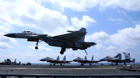 FILE PHOTO: Chinese People's Liberation Army (PLA) naval drill in the South China Sea.