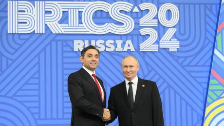 Russian President Vladimir Putin and Serbian Deputy Prime Minister Aleksandar Vulin at the welcoming ceremony for the heads delegations' of the 16th BRICS Summit.