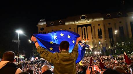 Supporters of Georgia’s pro-Western and pro-EU opposition parties gather outside the parliament in Tbilisi, October 28, 2024.