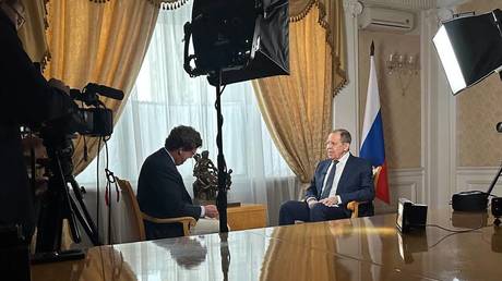 American Journalist Tucker Carlson and Russian Foreign Minister Sergey Lavrov.