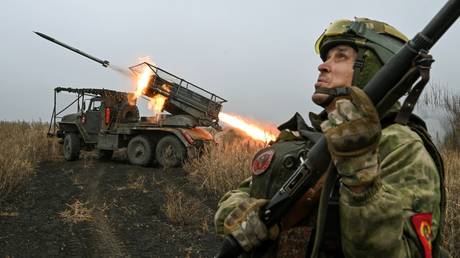 Russian forces use the Grad multiple launch rocket system to fire on Ukrainian positions in the Krasnogorovka area.