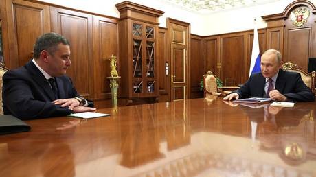 Russian President Vladimir Putin holds a meeting with MP Aleksandr Khinstein at the Kremlin.