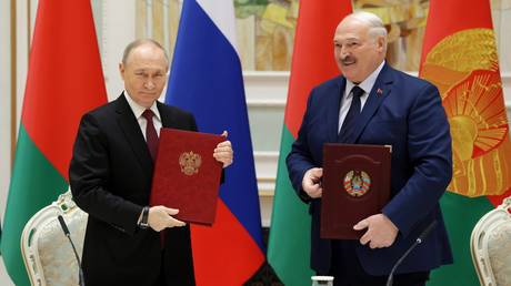 Russian President Vladimir Putin and Belarusian President Alexander Lukashenko attend a signing ceremony following a meeting of the Supreme State Council of the Russia-Belarus Union State marking the 25th anniversary of the Union State Treaty in Minsk, Belarus.