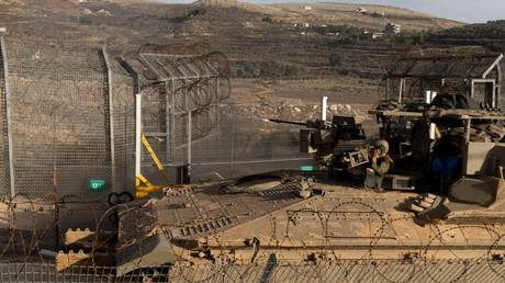 An Israeli armored personnel carrier at the border with Syria, December 9, 2024.