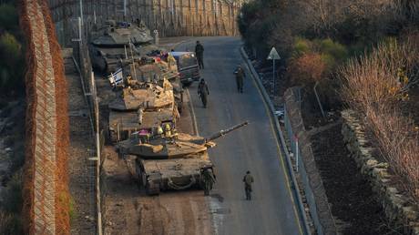 Israeli troops near the buffer zone between Syria and Israel in the Golan Heights on 8 December, 2024.