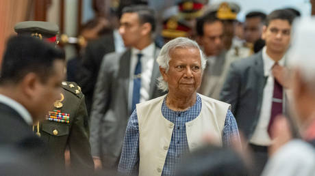 Nobel peace laureate Muhammad Yunus is taking the oath to lead Bangladesh's interim government as its chief adviser at the Bangabhaban in Dhaka, Bangladesh, on August 8, 2024.